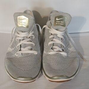 Nike Women's Silver and White Sneakers